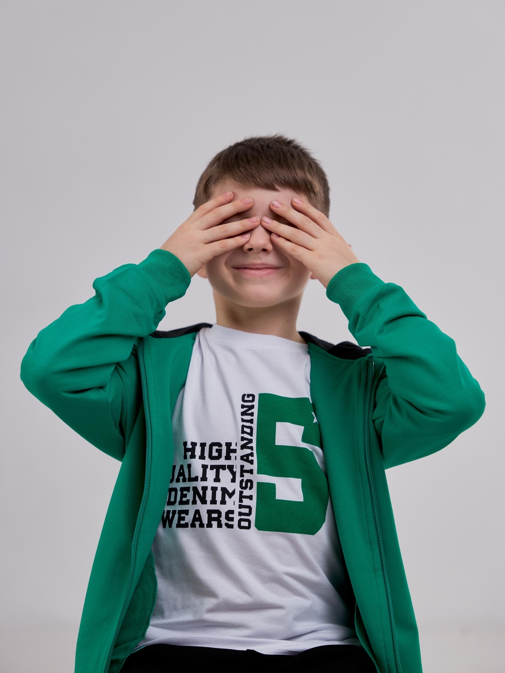 Зелений спортивний костюм